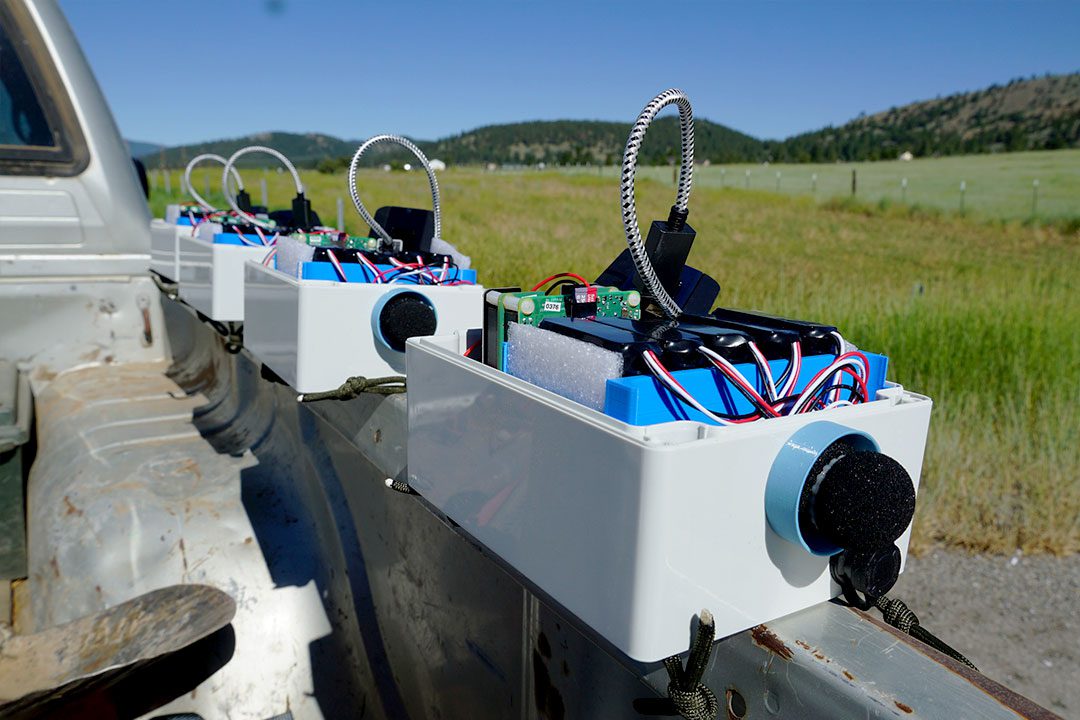 Mechanical units on the side of a pickup truck/